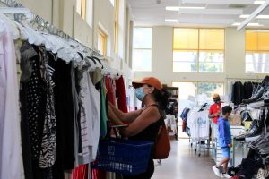 Shoppers browse the racks at Goodwill on San Pablo Ave. in Berkeley, a potential victim of thrift store 