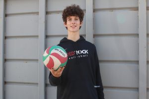 Paul Regier poses with a volleyball.