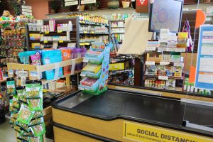 A checkout counter lies empty in Berkeley Natural Grocery Company, a health foods store located in the Westbrae Neighborhood. A recent ordinance has modified what foods will be able to be presented at checkout. 
