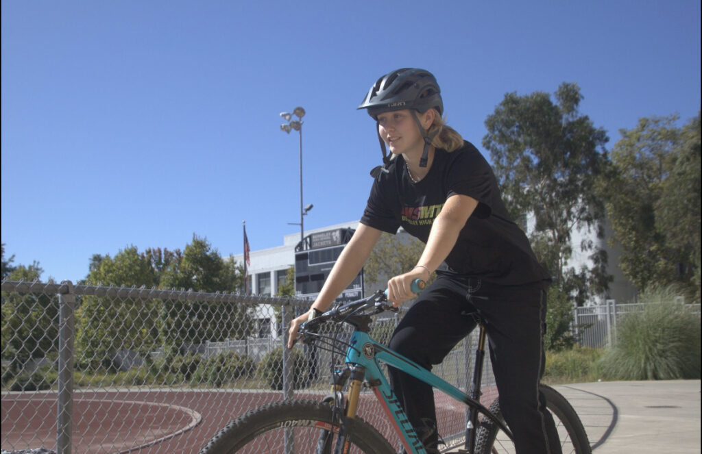 Rowan Nykamp (they/them) is on mountain biking.