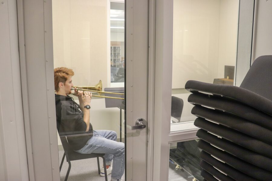 Luke De Valpine practices in a new soundproofed practice room.
