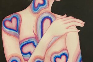 A woman with blue hearts aross her body