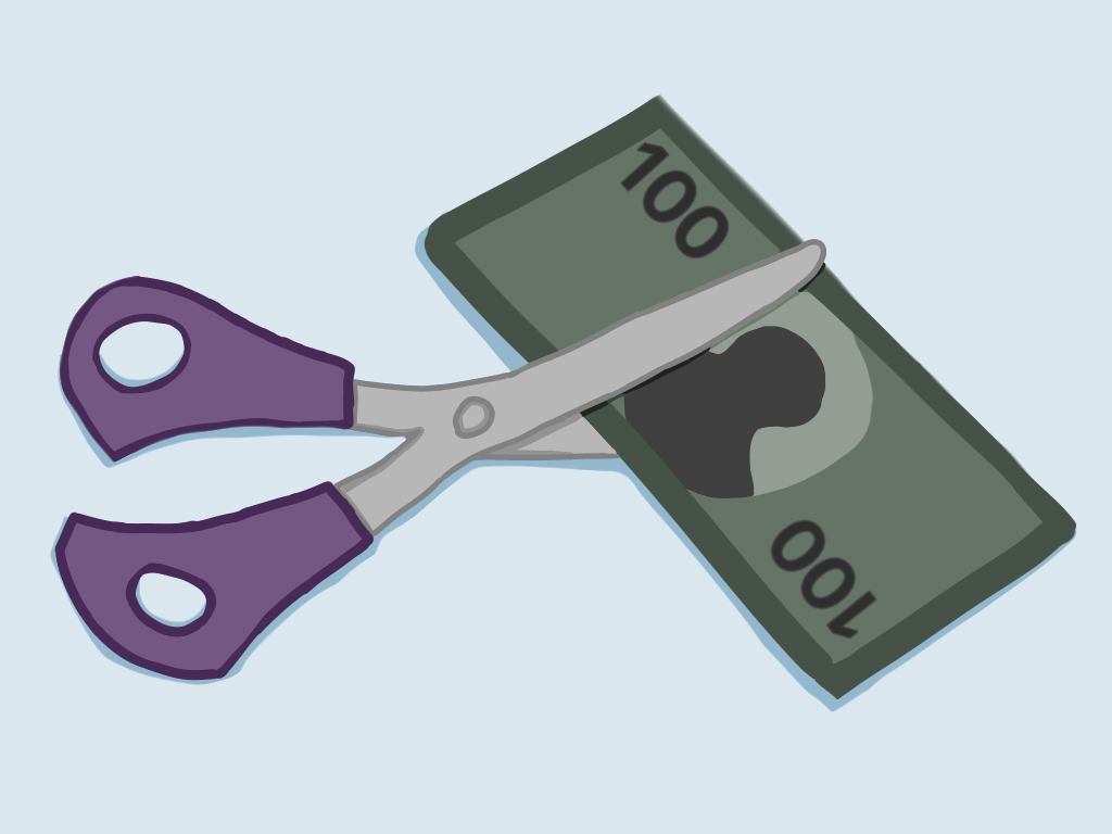 A scissor cutting a 100 dollar bill.