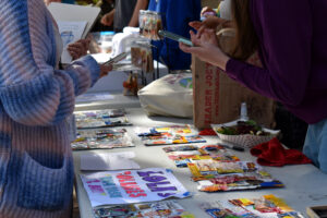 A BHS student examines a table of crafts on display at the Fall Craft Fair.