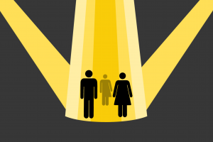 Three people light up by a spotlight.