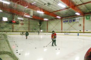 A hockey player skates on the ice at the Oakland Ice Center, one of the few ice rinks in the Bay Area.